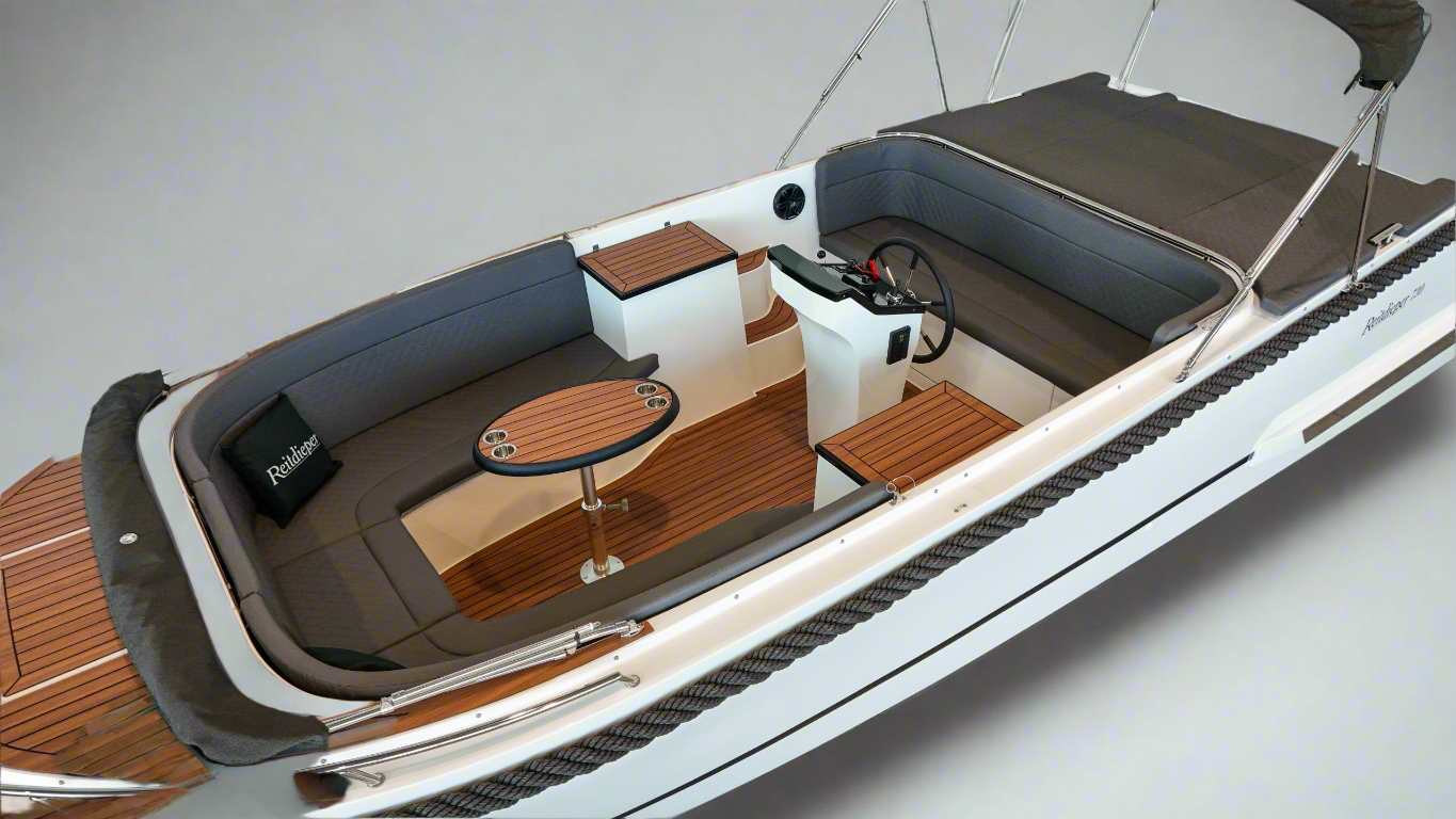 Reitdieper 730 Tendersloep - 7 meter met luxe stuurconsole, teakvloer en comfortabele zitbanken, ideaal voor ontspannen vaartochten.